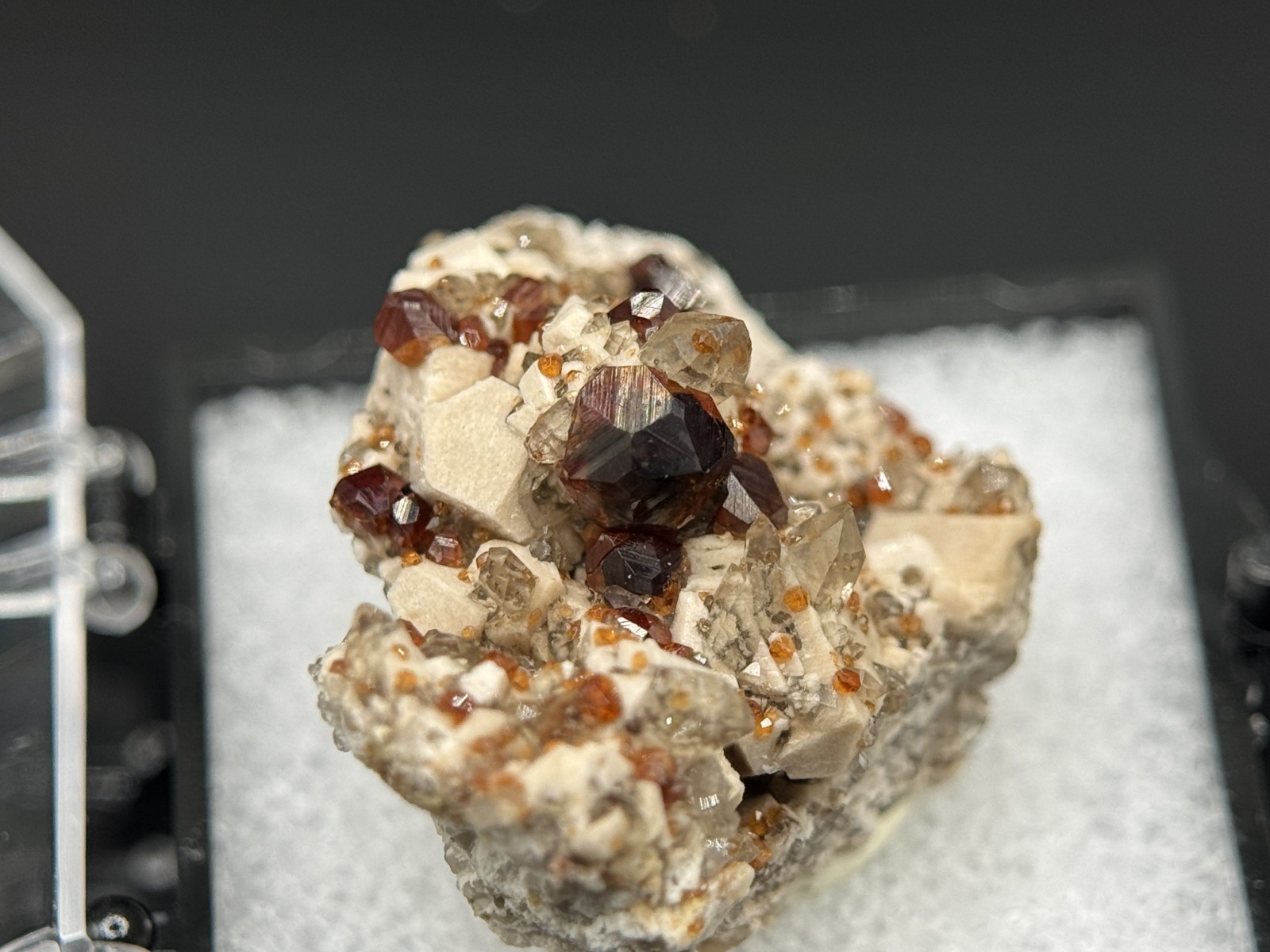 Exceptional spessartine garnets on smoky quartz & microcline from Fujian, China