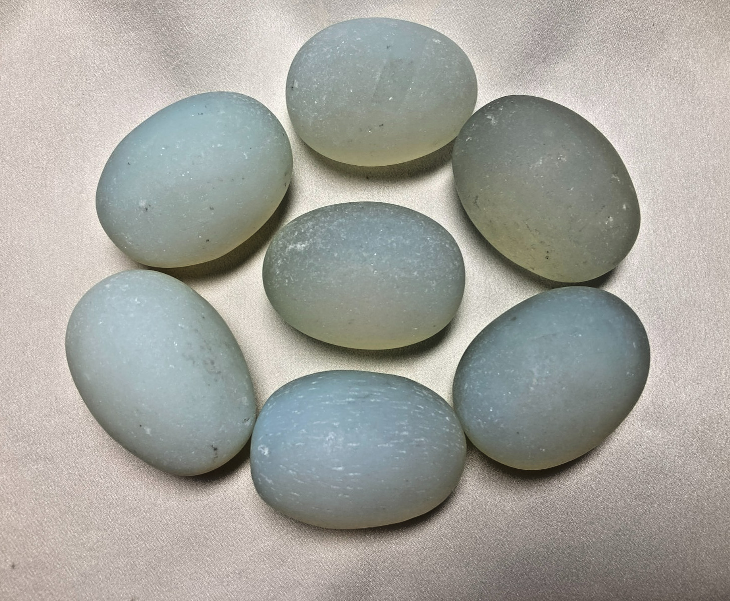 Seven Opalite Glass Eggs; 2 Inches Long; Milky Blue to Blue Green in Color