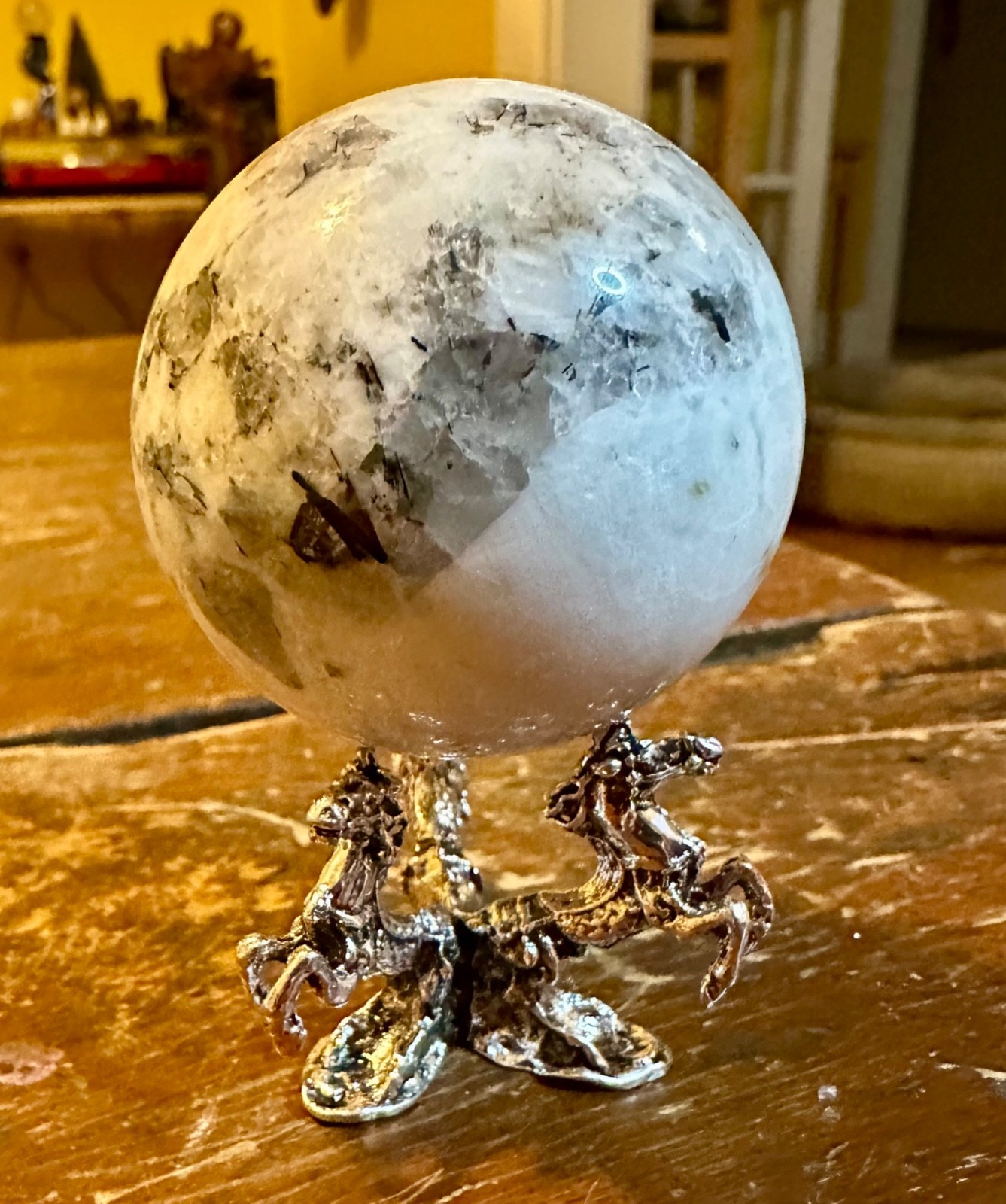 Moonstone sphere with tourmaline inclusions and metal horse stand Free shipping