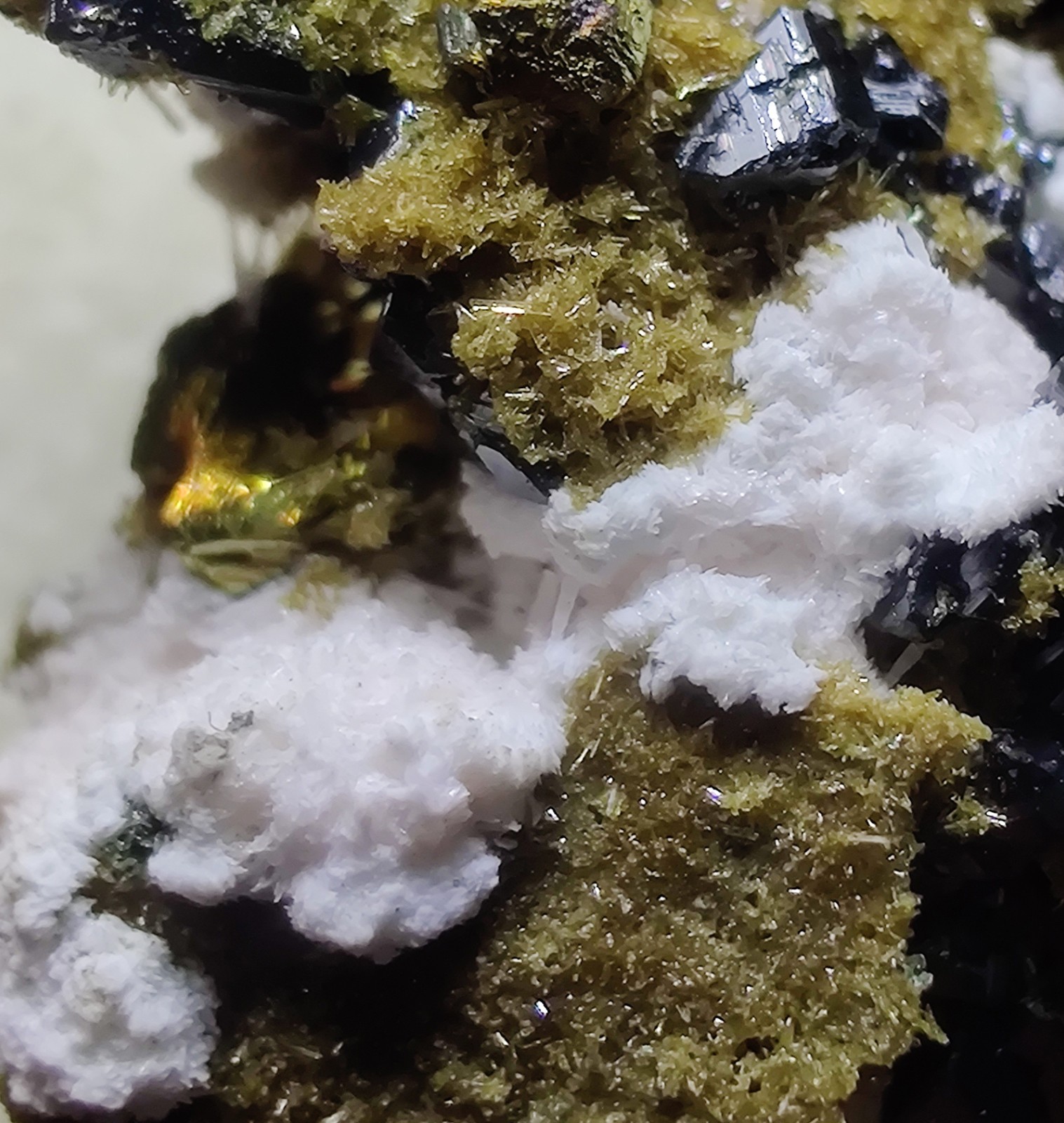 Epidote, Sphalerite, Chalcopyrite crystals etc. Silverton, Colorado. 2.2 cm.