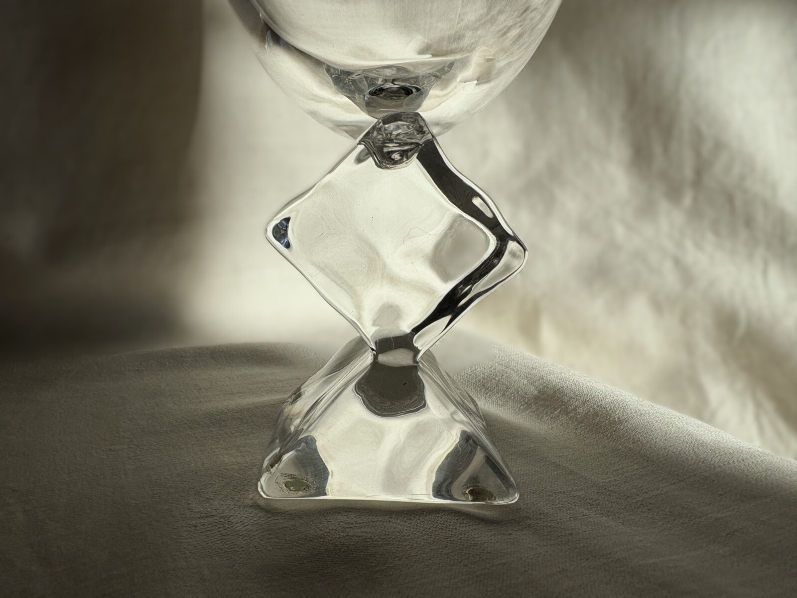 French crystal table glass with Lucite stem melting ice cube. 7″ h. Vintage 1970