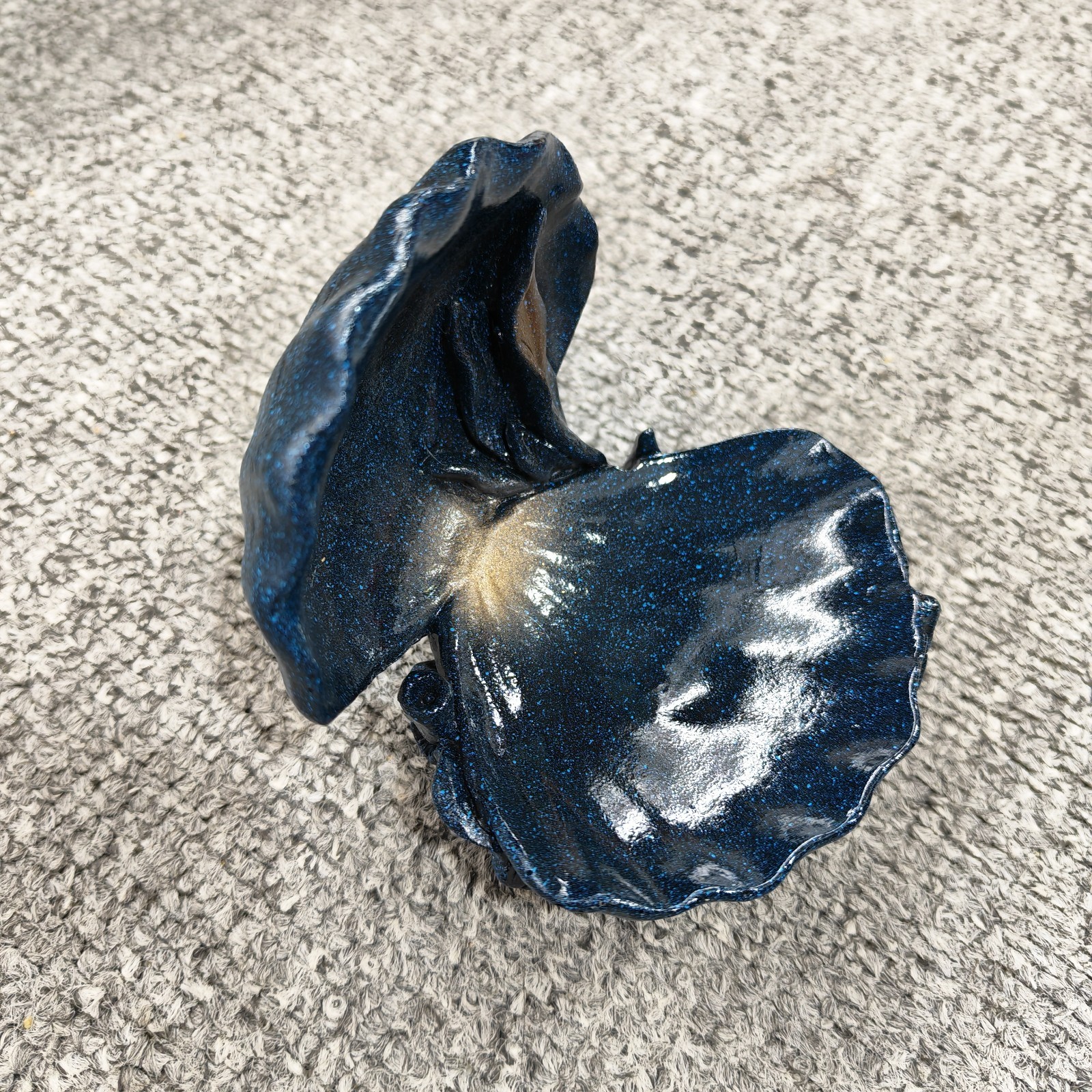 dark blue clamshell stand for natural crystal sphere