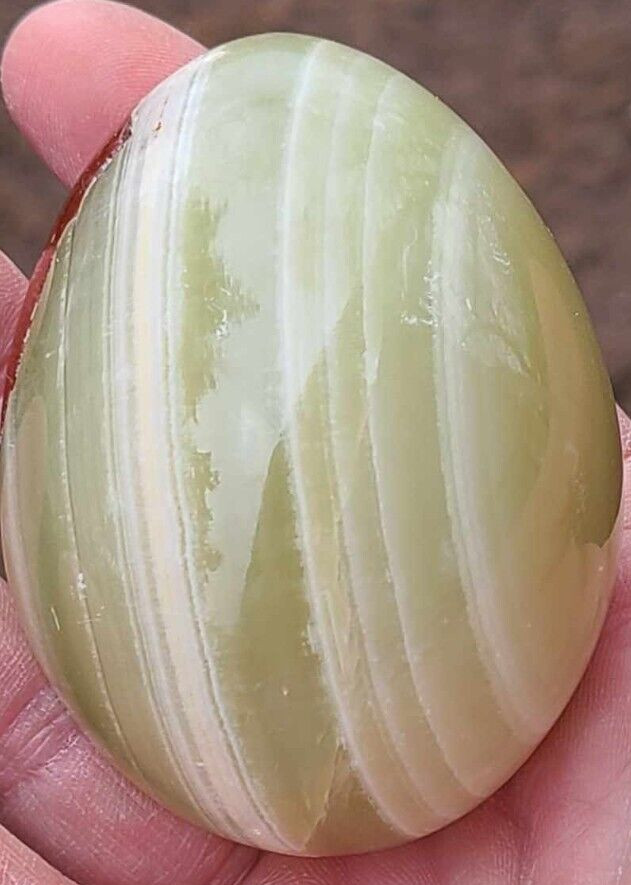 Green Onyx Egg Stone with brown marking. The egg is ~2-3/8″ long and 2″ wide.