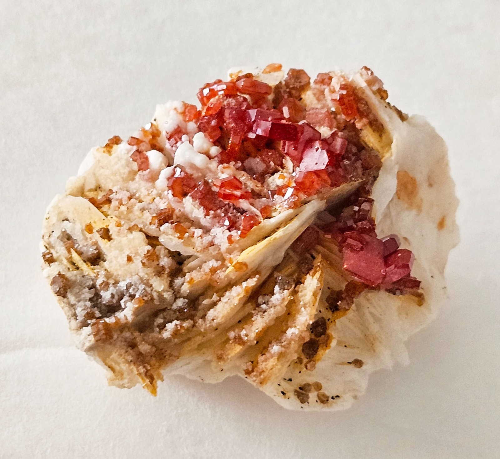 Red and Brown Vanadinite Crystals on white Barite – Mibladen, Morocco