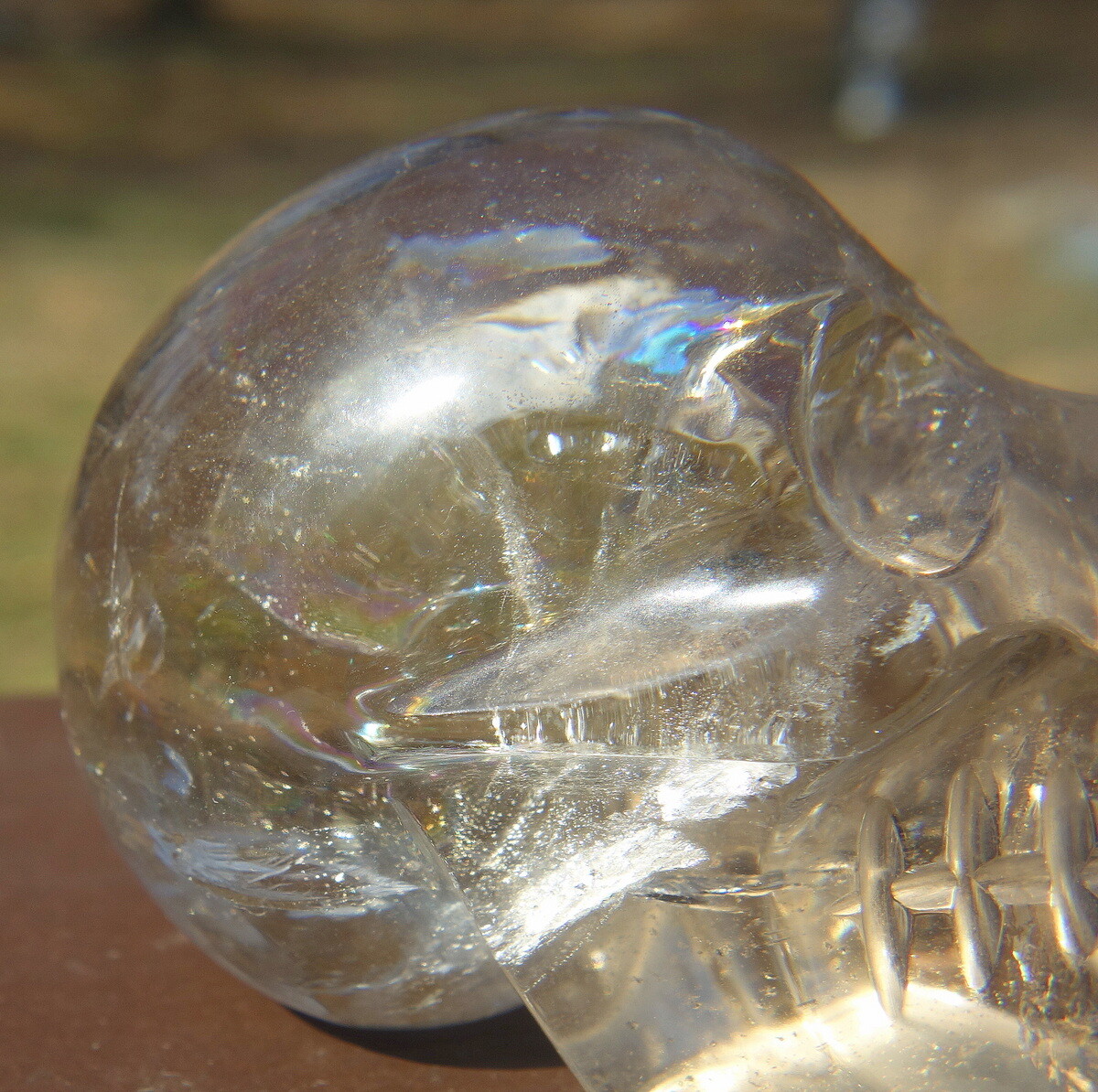 Quartz Crystal Skull Carving with Rainbows and a Touch of Smoky