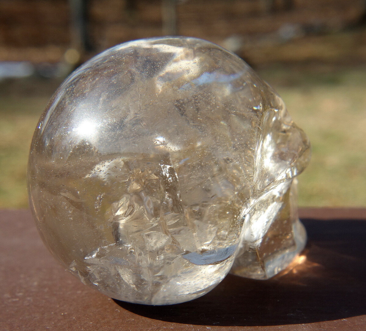 Quartz Crystal Skull Carving with Rainbows and a Touch of Smoky