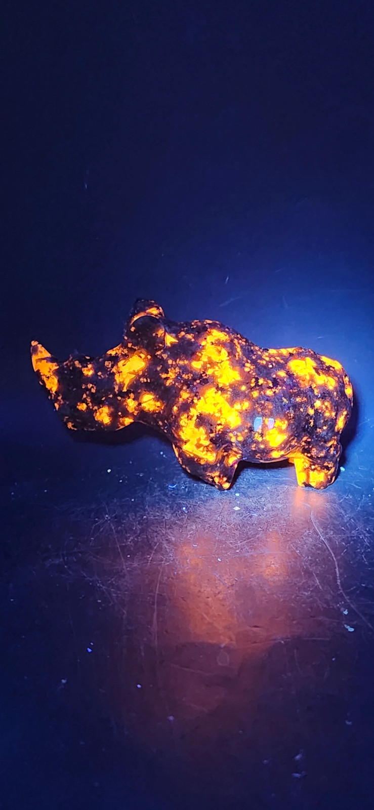 Flame stone “yooperlite” rhino! 8.5 ounces, 4 inches long, 2 tall
