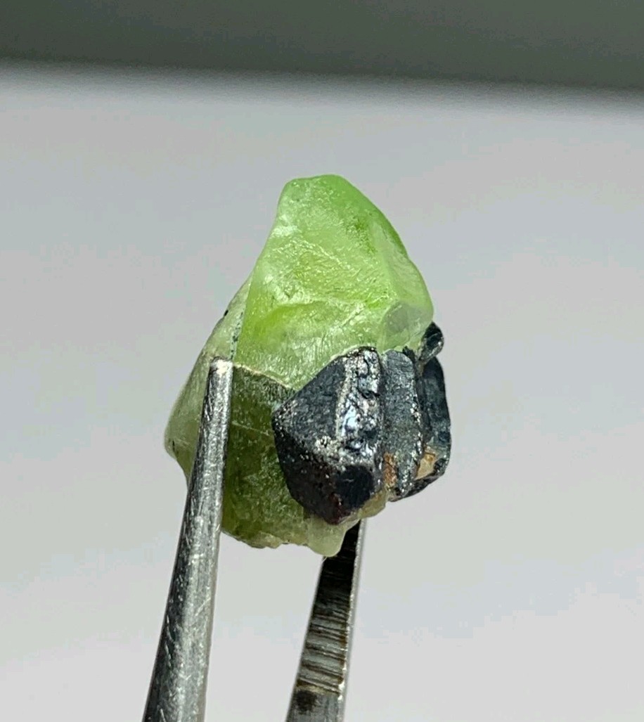 3.5 gm Small Size Stunning Peridot Crystal Combine With Magnetite Crystal.
