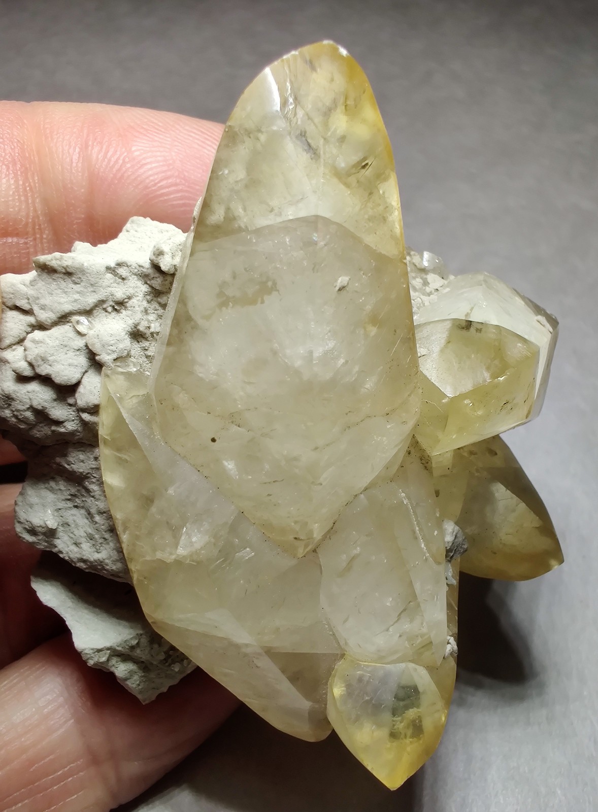 Calcite crystals on Limestone matrix, fluorescent. Indiana. 101 grams.