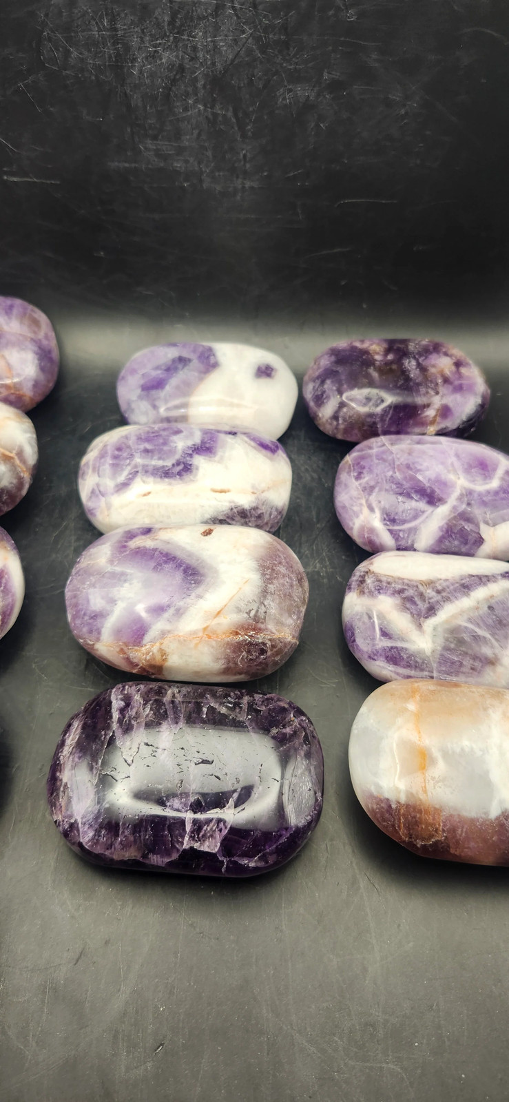 Dream amethyst palm stone! 2 too 4 ounces 2 inches long, 1.5 wide