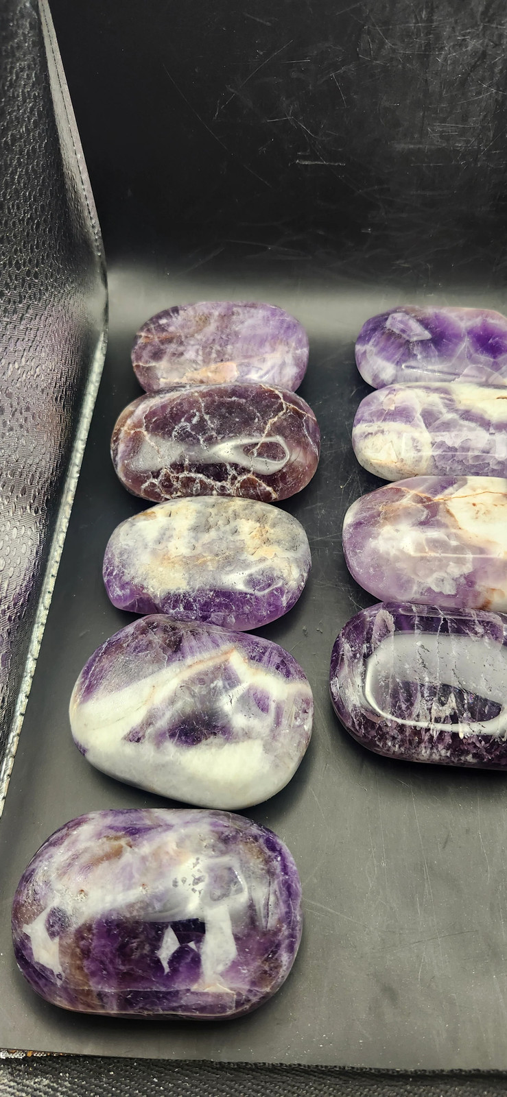 Dream amethyst palm stone! 2 too 4 ounces 2 inches long, 1.5 wide