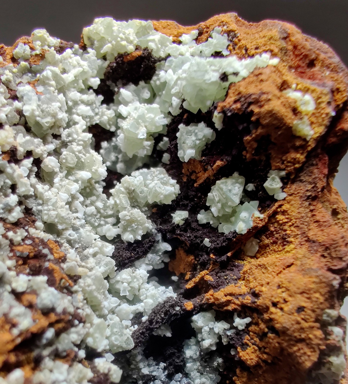 Fluorescent Adamite, Smithsonite on Limonite. Ojuela Mine, Mexico. 163 grams.