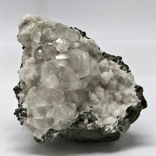 KB: BRIGHT SW FL. RED CALCITE XLS. ON FL. SW WHITE ARAGONITE MATRIX POONA, INDIA