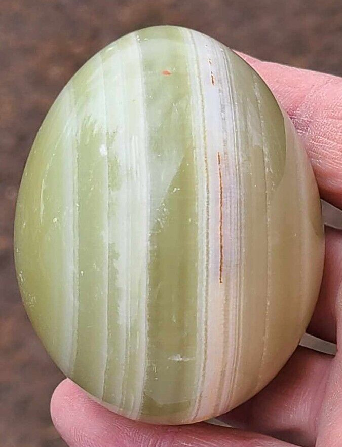 Green Onyx Egg Stone with brown marking. The egg is ~2-3/8″ long and 2″ wide.