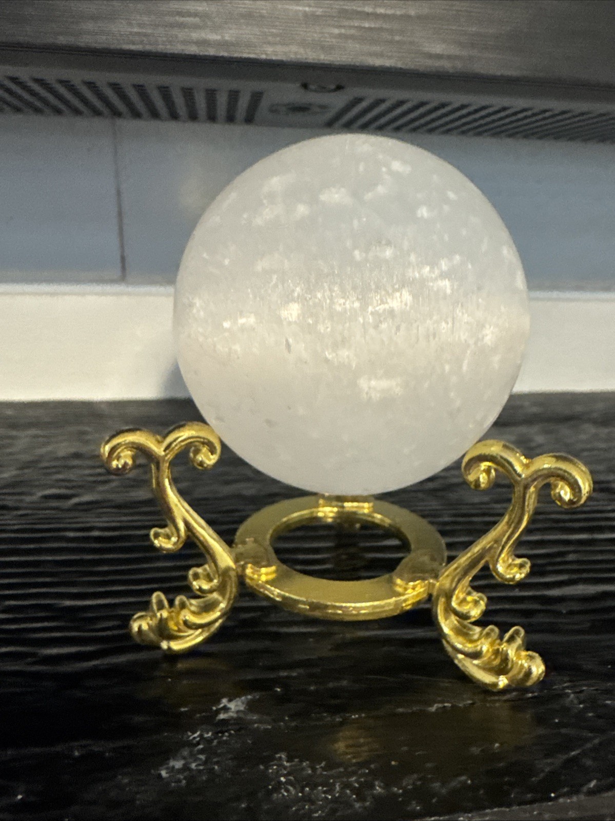 Selenite Crystal Sphere On Gold Metal Stand 226 Grams 22 mm