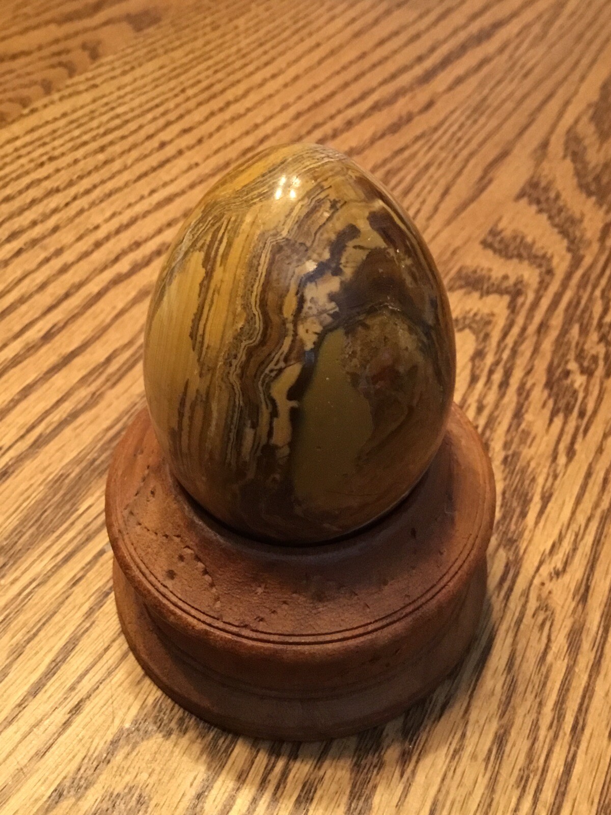 Onyx Naturally Banded Polished Egg With Wooden Stand