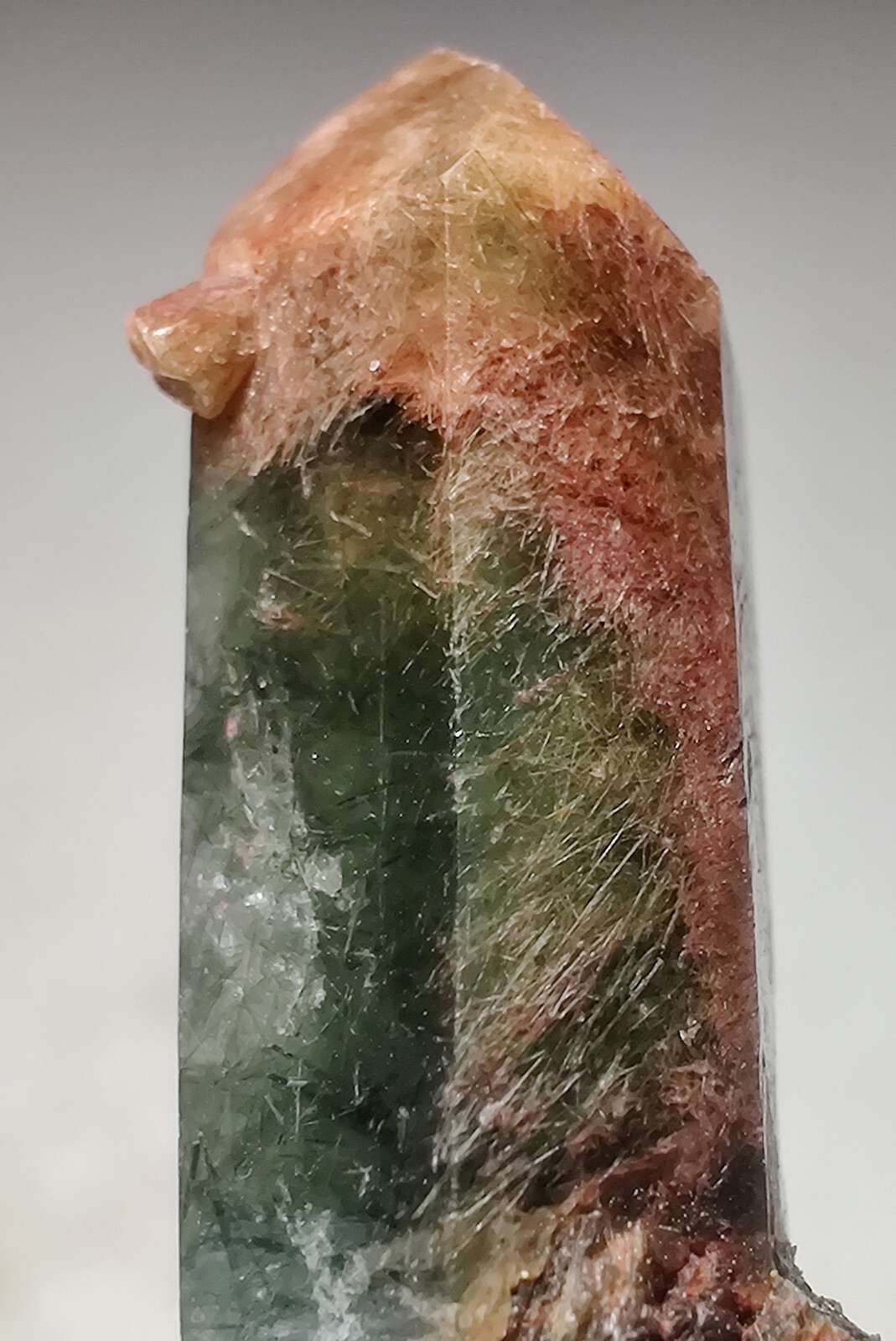 Epidote included Quartz crystal. Balochistan, Pakistan. 3 cm.