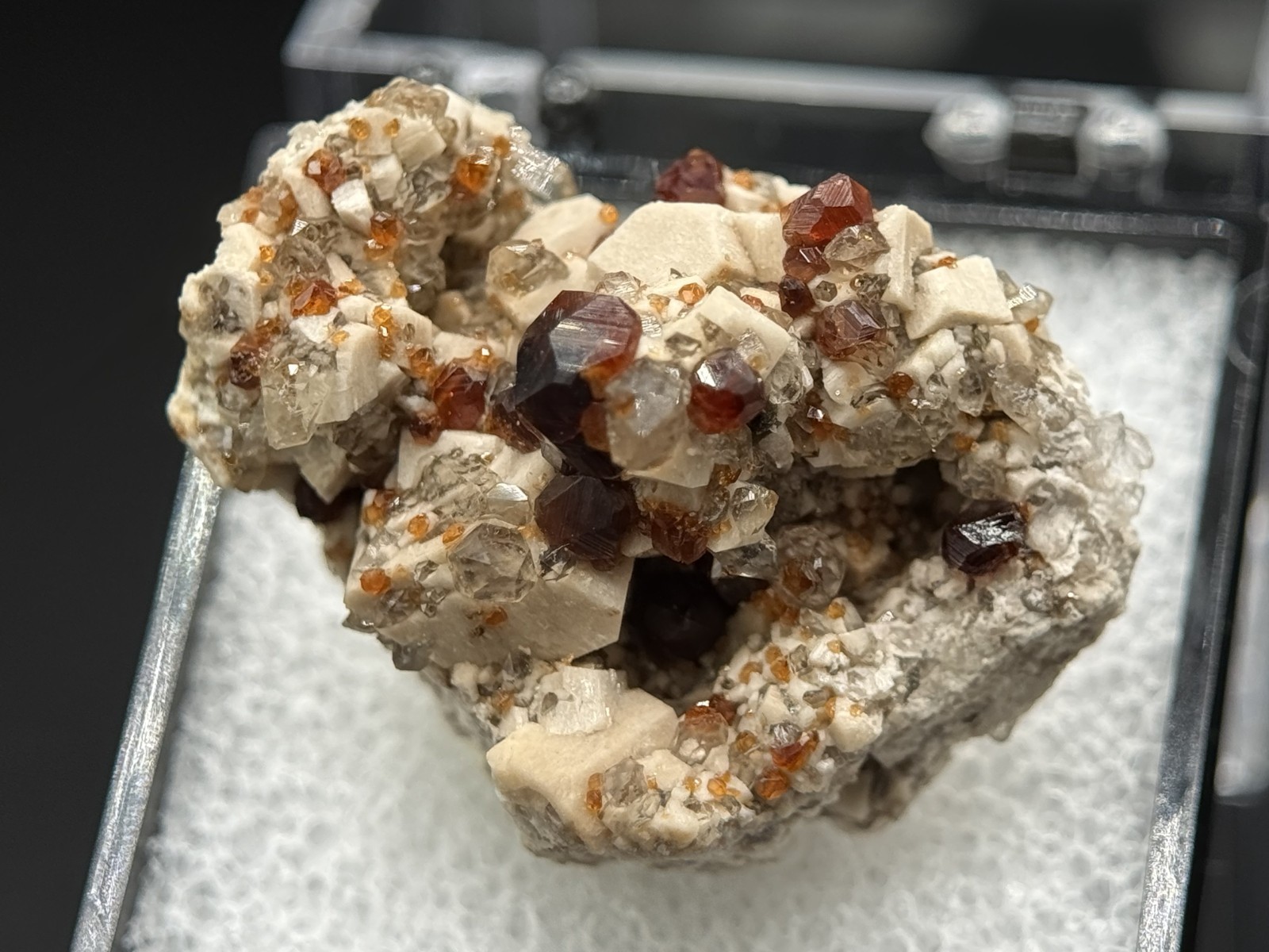 Exceptional spessartine garnets on smoky quartz & microcline from Fujian, China
