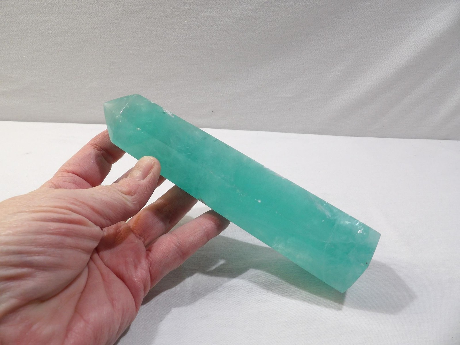 Green fluorite crystal tower, hexagon column obelisk, 6.75L X 1.75W, translucent