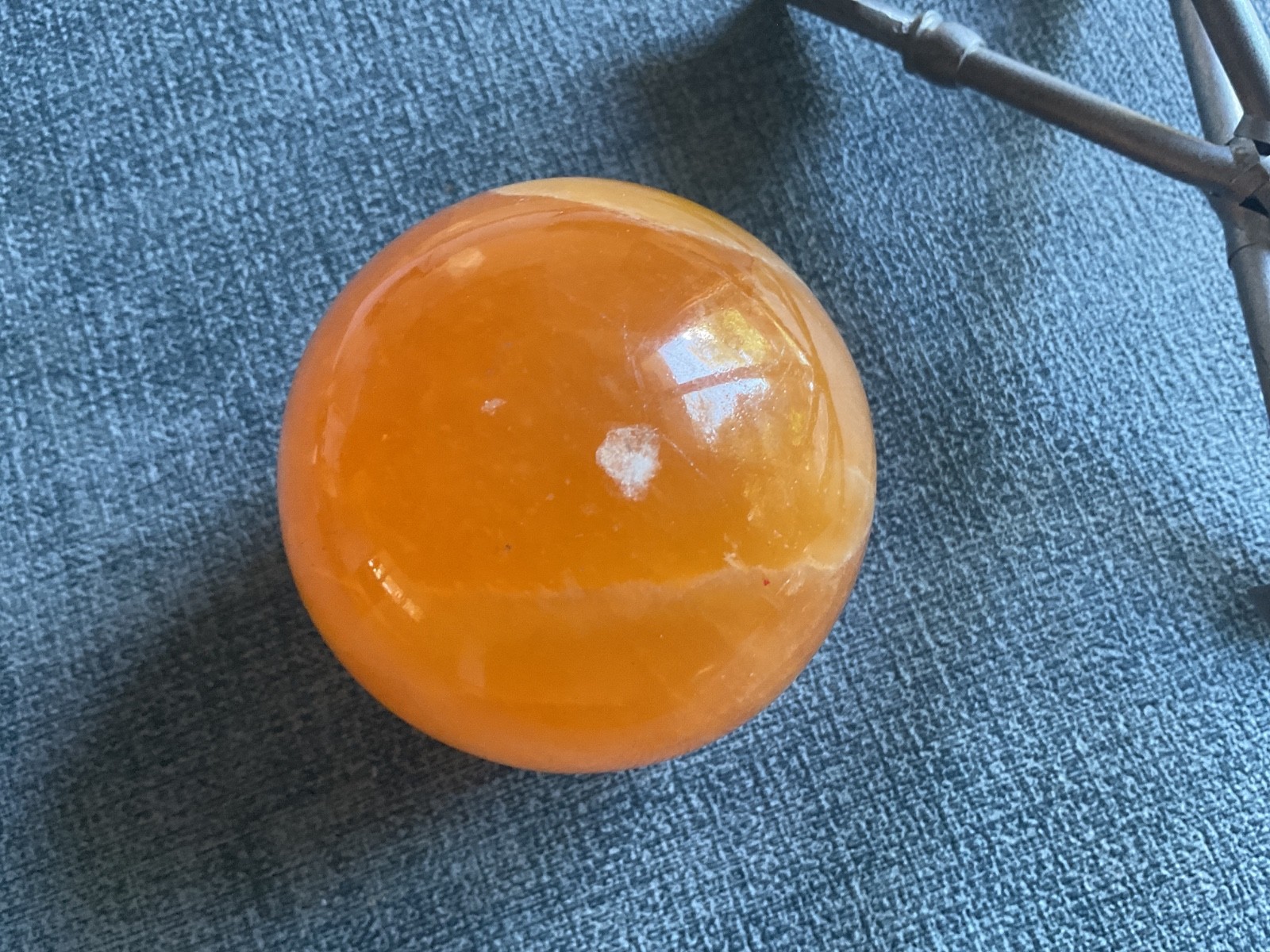 orange stone ball 3″ and arrow tripod stand pewter