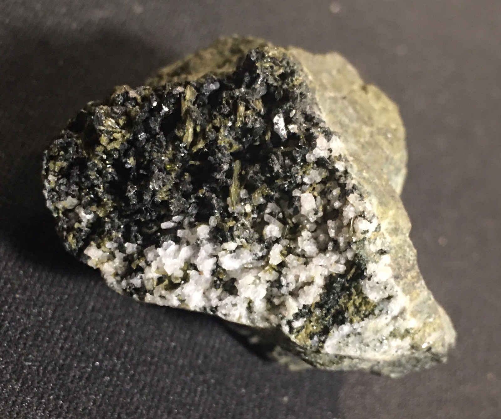 Epidote with Adularia, Achenthal, Tyrol, Austria.