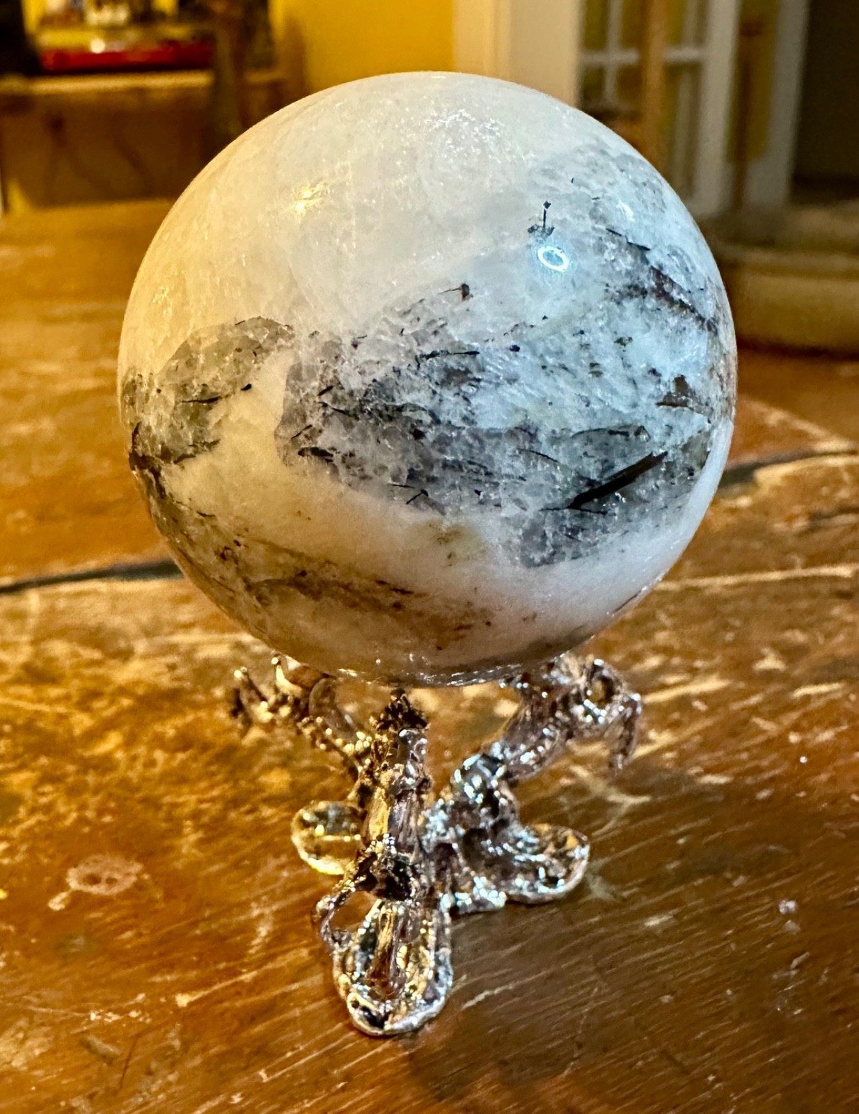 Moonstone sphere with tourmaline inclusions and metal horse stand Free shipping