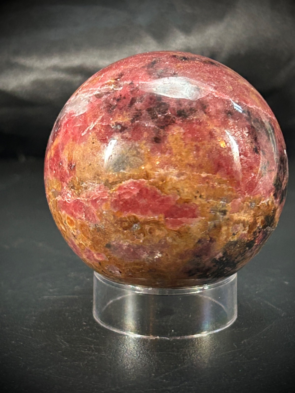 2.06″ Rhodonite Sphere With Acrylic Stand 9.9oz (281 grams)