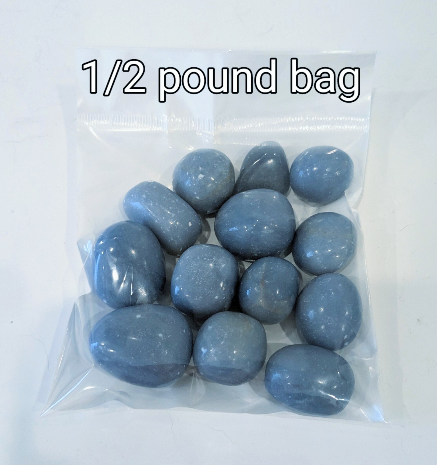 1/2 Pound Tumbled Angelite Crystal 13-15 Pieces p/bag & .75″- 1.25″ in Size