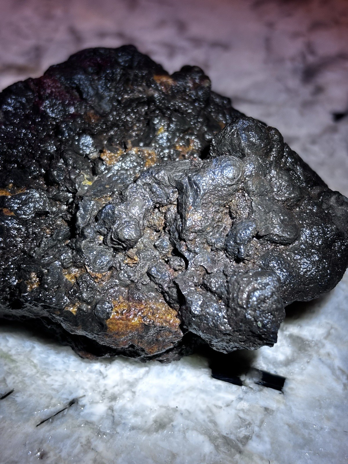 this rock looks like it came from hell! iron ore or silver ore ? meteorite?