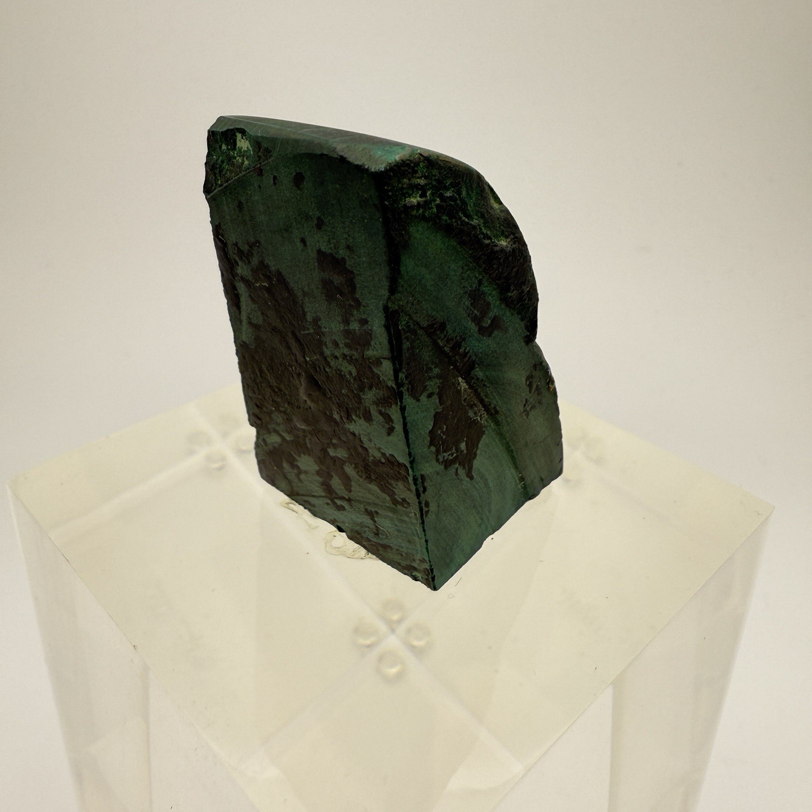 Dark green banded malachite on a lucite Base artist Unknown Signed – “?” Ax