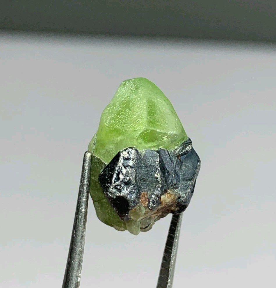 3.5 gm Small Size Stunning Peridot Crystal Combine With Magnetite Crystal.