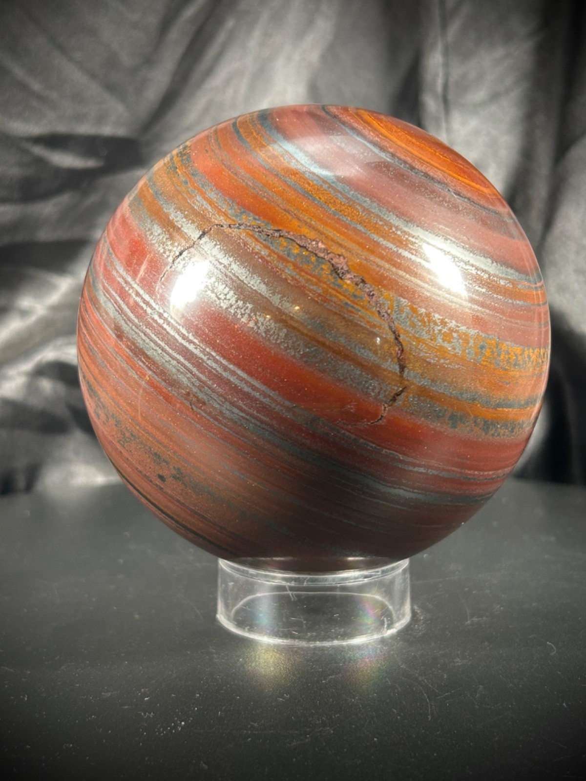 4.05″ Tiger Iron (AKA Mugglestone) Sphere With Acrylic Stand 4lb 5.5oz (1.968KG)