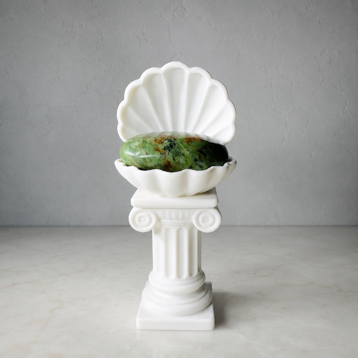 Venus Shell Pedestal Palm Stone Holder with Included Green Opal Crystal