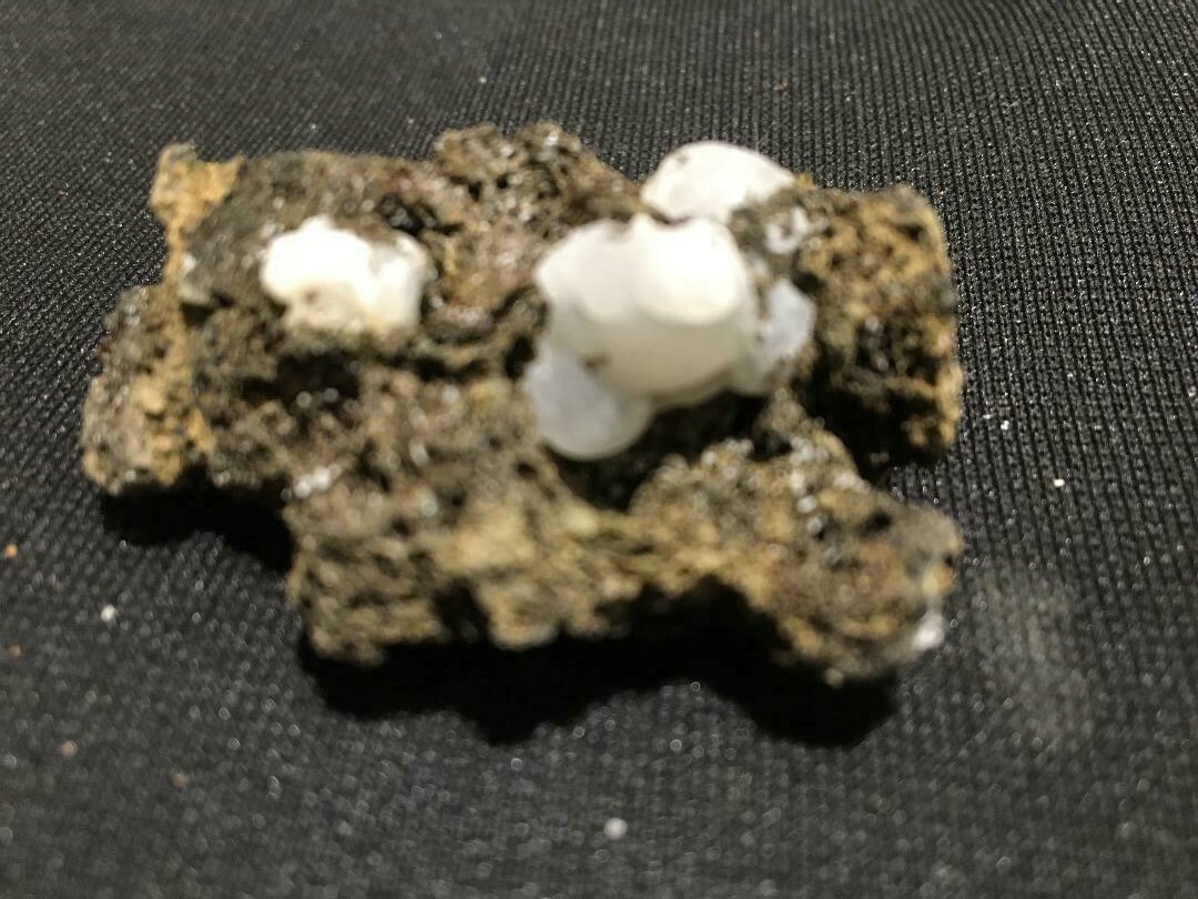 KB: FANTASTIC! BRIGHT FL. & PHOS. BLUE/WHITE SW CALCITE IN LAVA ROCK, GERMANY
