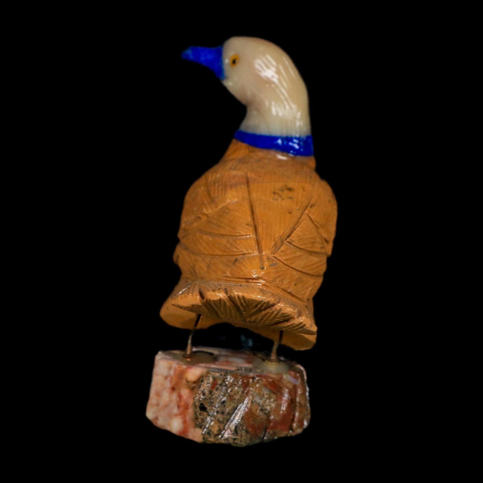 3.5″ Hand Carved Duck Perched on Red White Calcite, Brown Calcite, And Sodalite