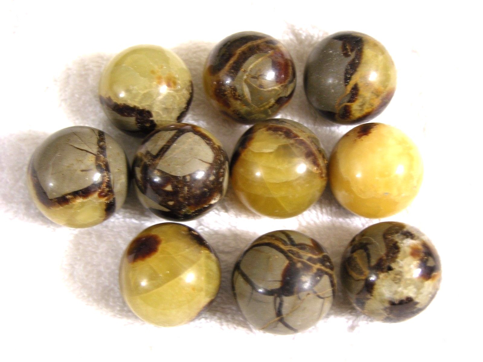 Septarian calcite spheres 1 1/4″ diameter 2 spheres per winner w/ring stands
