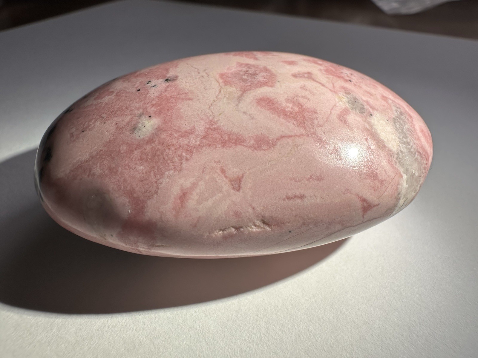 Polished Pink Rhodonite Palm Stone, Oval Egg Shape Mineral Specimen, 3 in