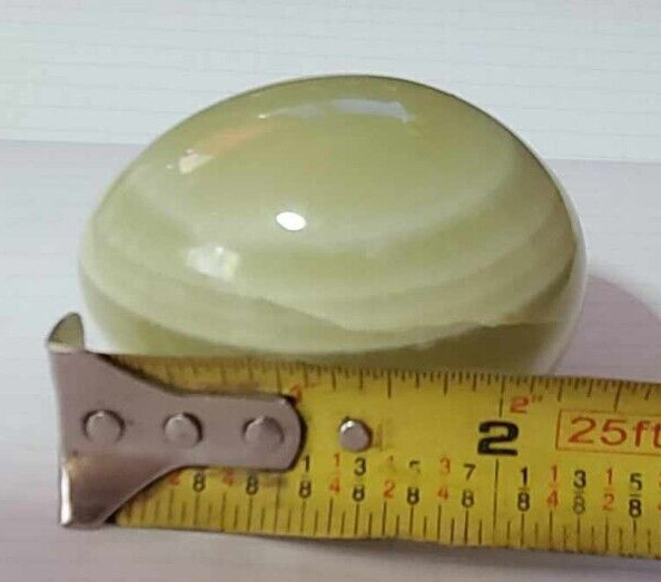 Green Onyx Egg Stone with brown marking. The egg is ~2-3/8″ long and 2″ wide.