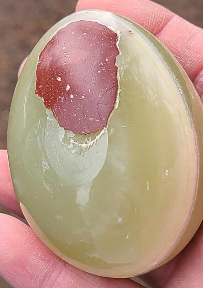 Green Onyx Egg Stone with brown marking. The egg is ~2-3/8″ long and 2″ wide.