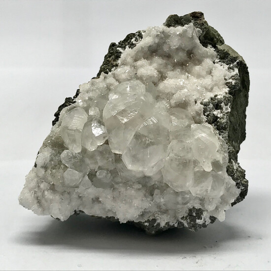 KB: BRIGHT SW FL. RED CALCITE XLS. ON FL. SW WHITE ARAGONITE MATRIX POONA, INDIA