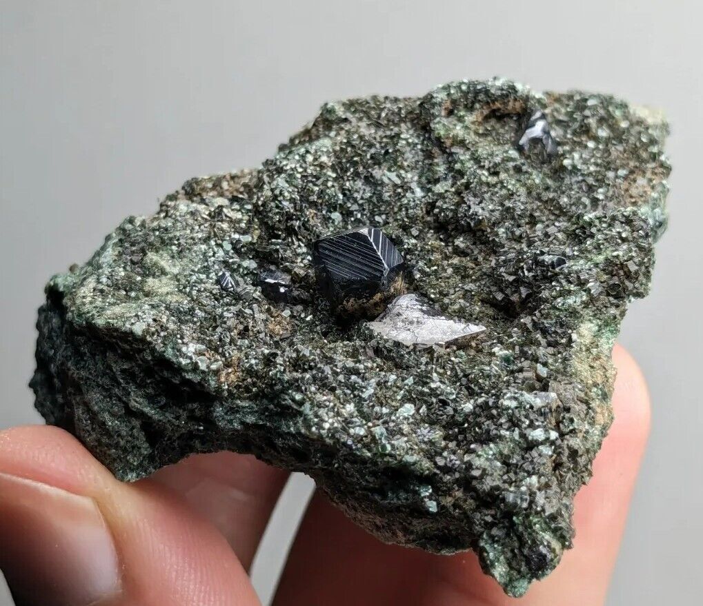 Beautiful sharp magnetite crystal with beautiful natural pattern on matrix rock