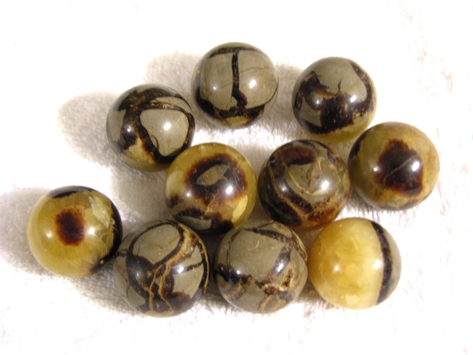 Septarian calcite spheres 1 1/4″ diameter 2 spheres per winner w/ring stands