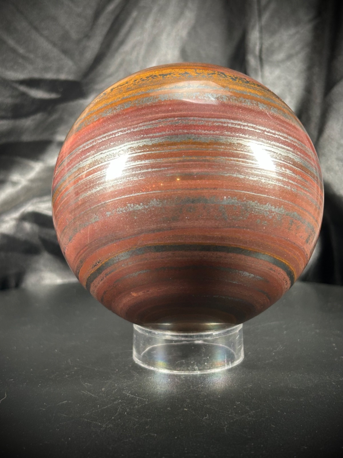 4.05″ Tiger Iron (AKA Mugglestone) Sphere With Acrylic Stand 4lb 5.5oz (1.968KG)