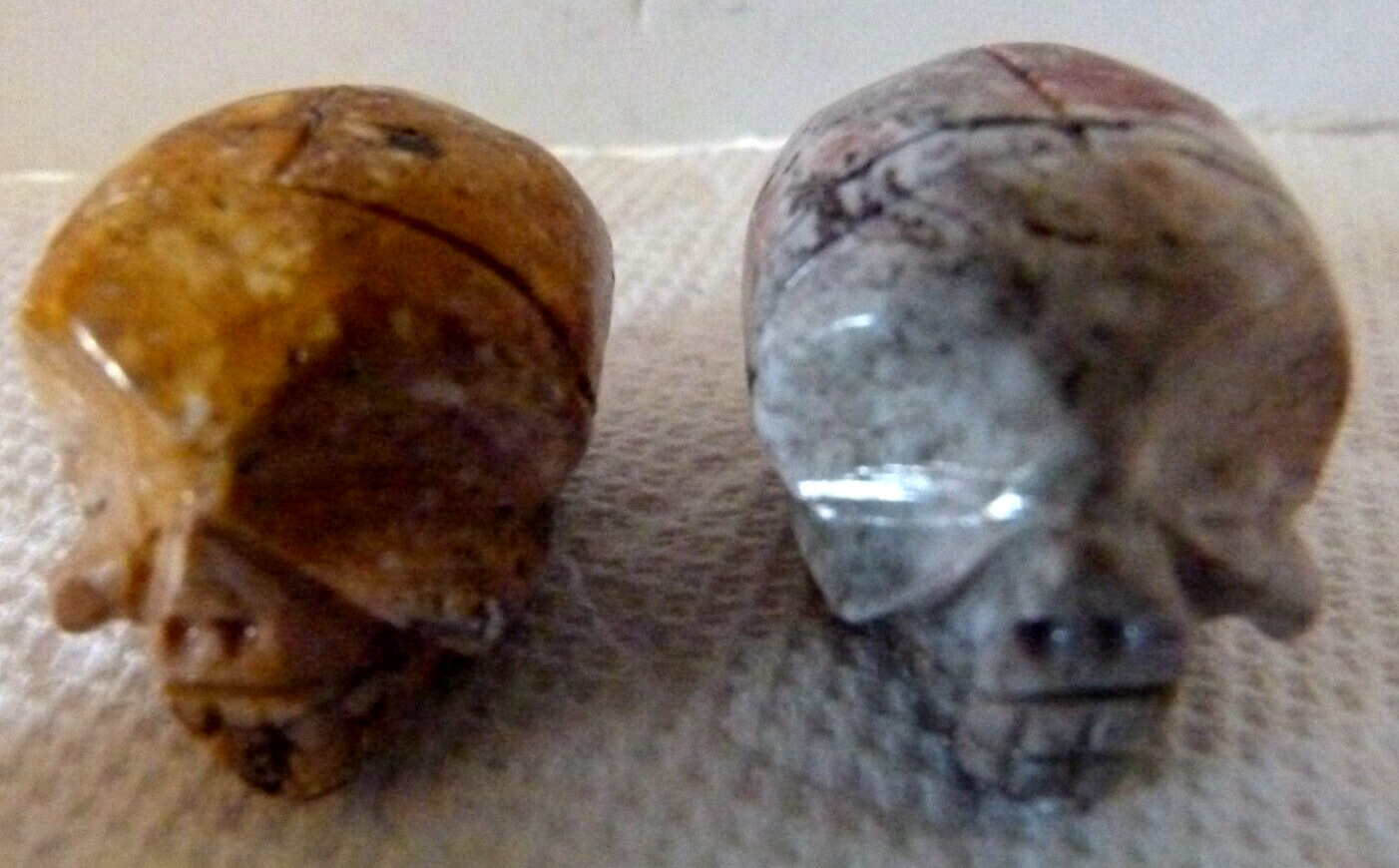 Lot of 7 small 1 1/8″ Jasper Carved Crystal Gemstone Skulls Reiki Healing