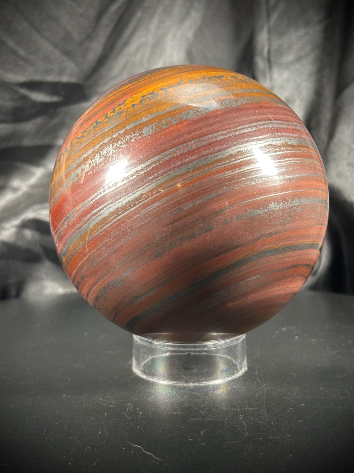 4.05″ Tiger Iron (AKA Mugglestone) Sphere With Acrylic Stand 4lb 5.5oz (1.968KG)