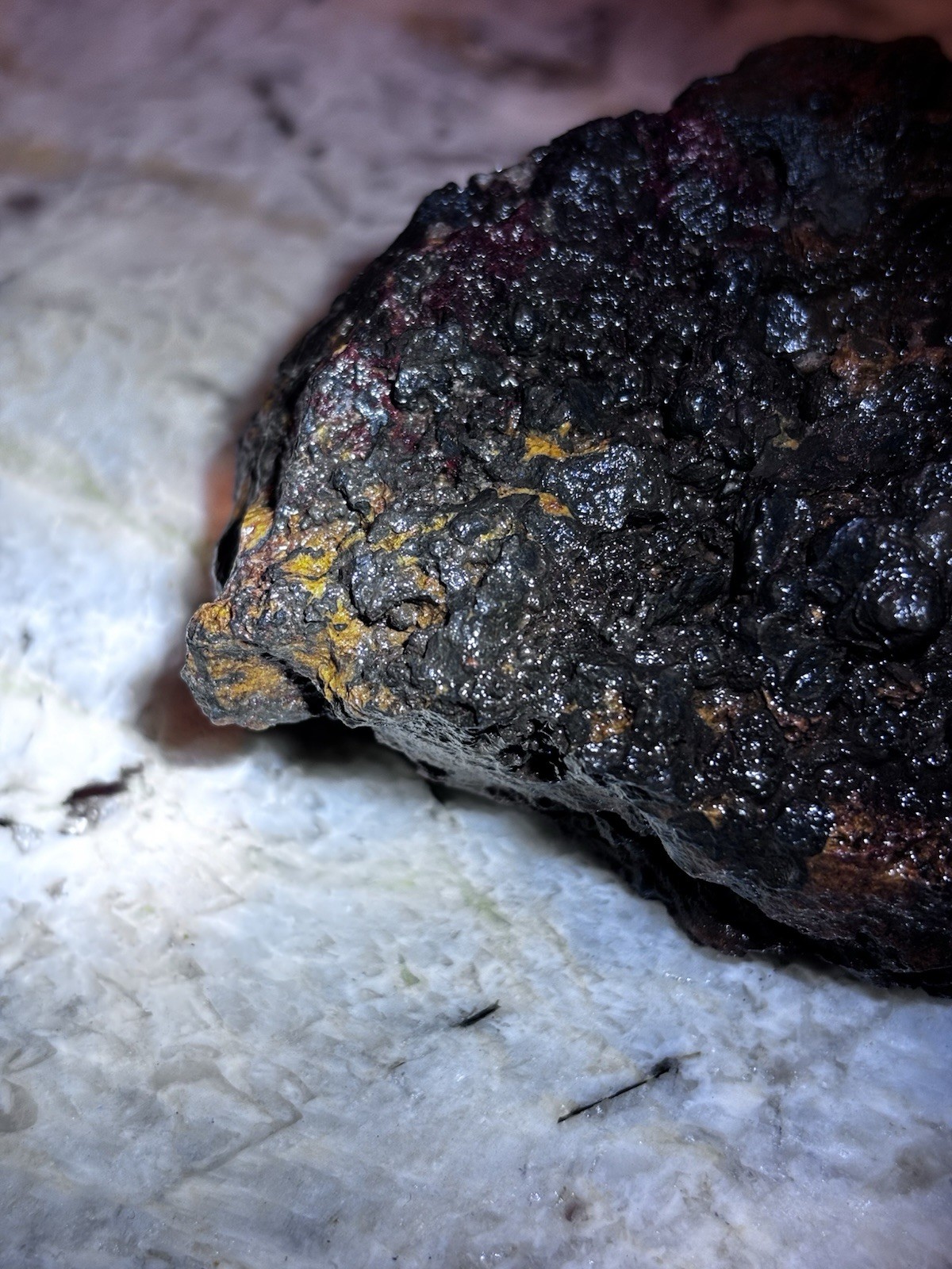 this rock looks like it came from hell! iron ore or silver ore ? meteorite?