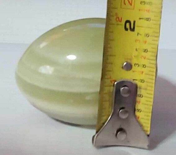 Green Onyx Egg Stone with brown marking. The egg is ~2-3/8″ long and 2″ wide.