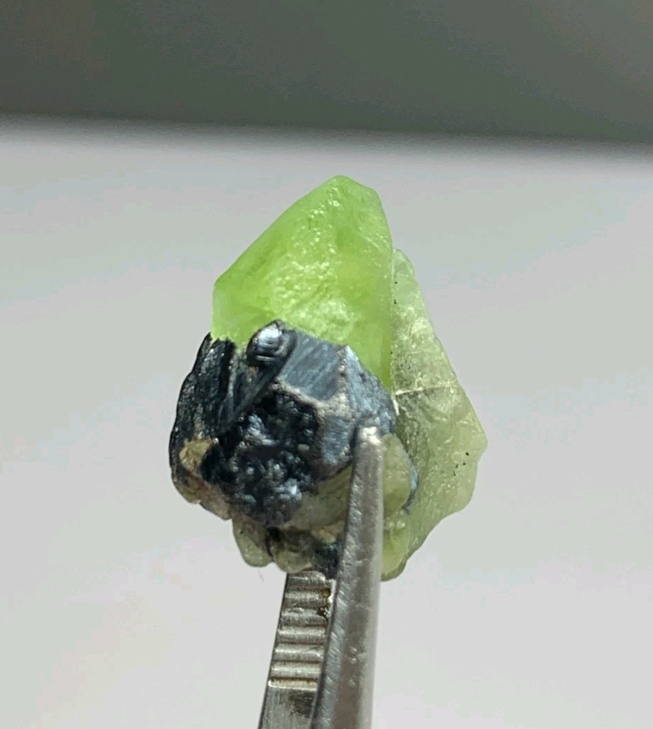 3.5 gm Small Size Stunning Peridot Crystal Combine With Magnetite Crystal.