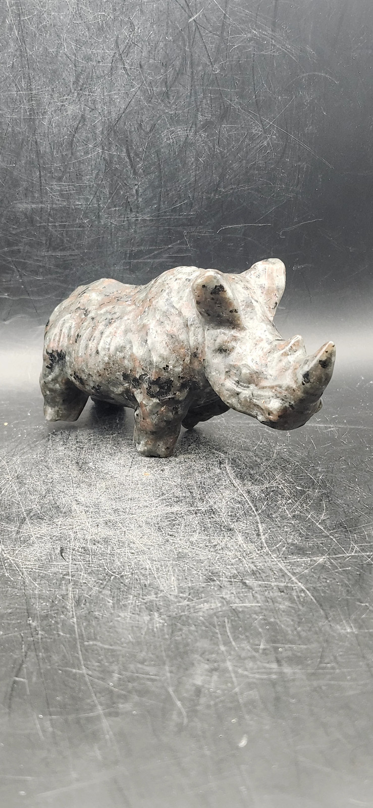 Flame stone “yooperlite” rhino! 8.5 ounces, 4 inches long, 2 tall