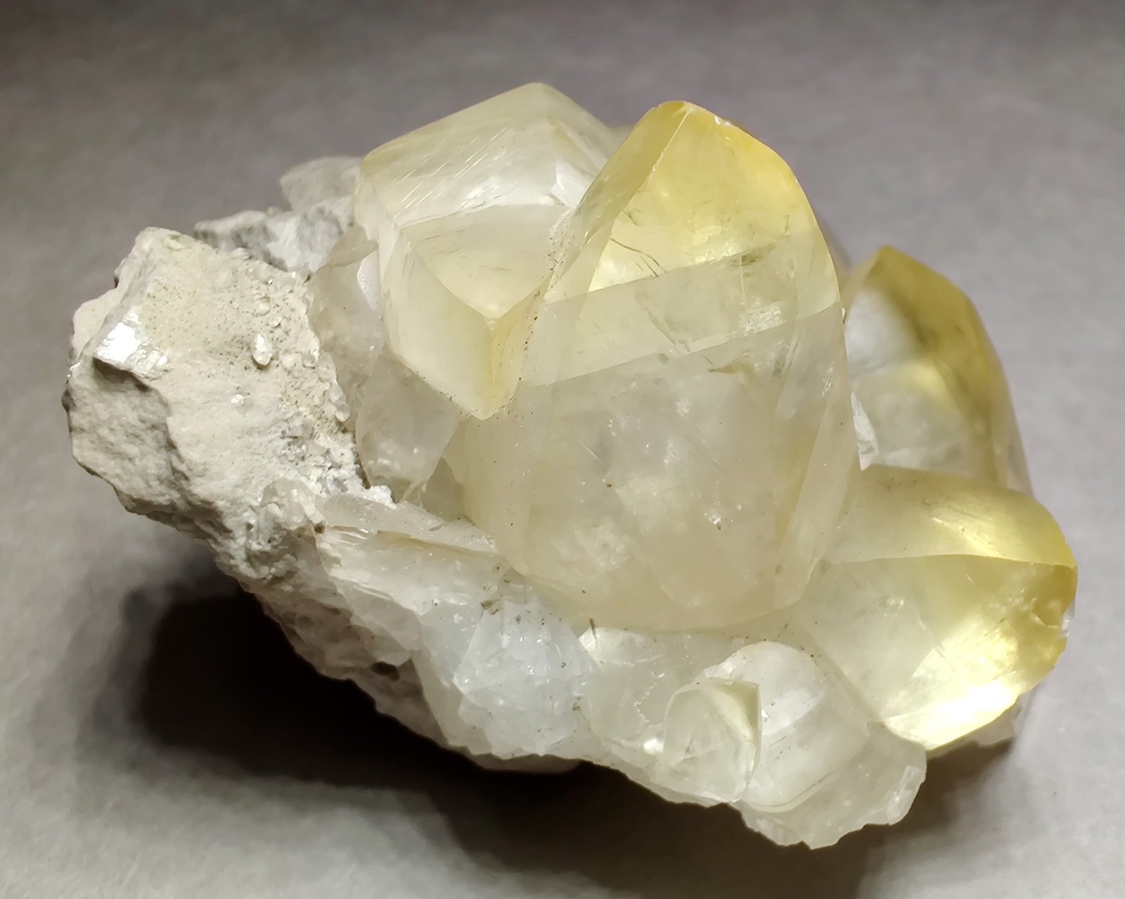 Calcite crystals on Limestone matrix, fluorescent. Indiana. 101 grams.